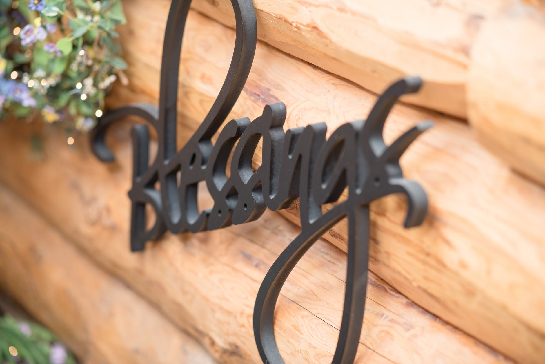 blessings signage mounted on wall